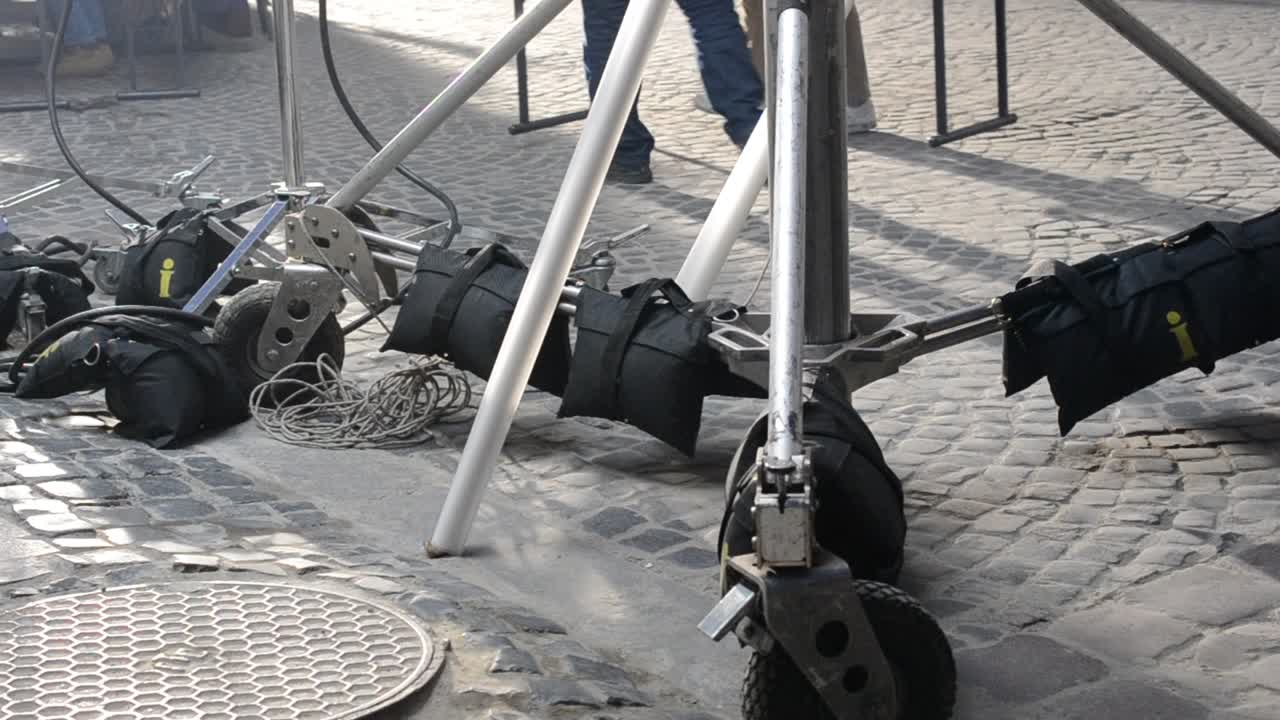 Equipment for video filming. Tripod with weighting compounds