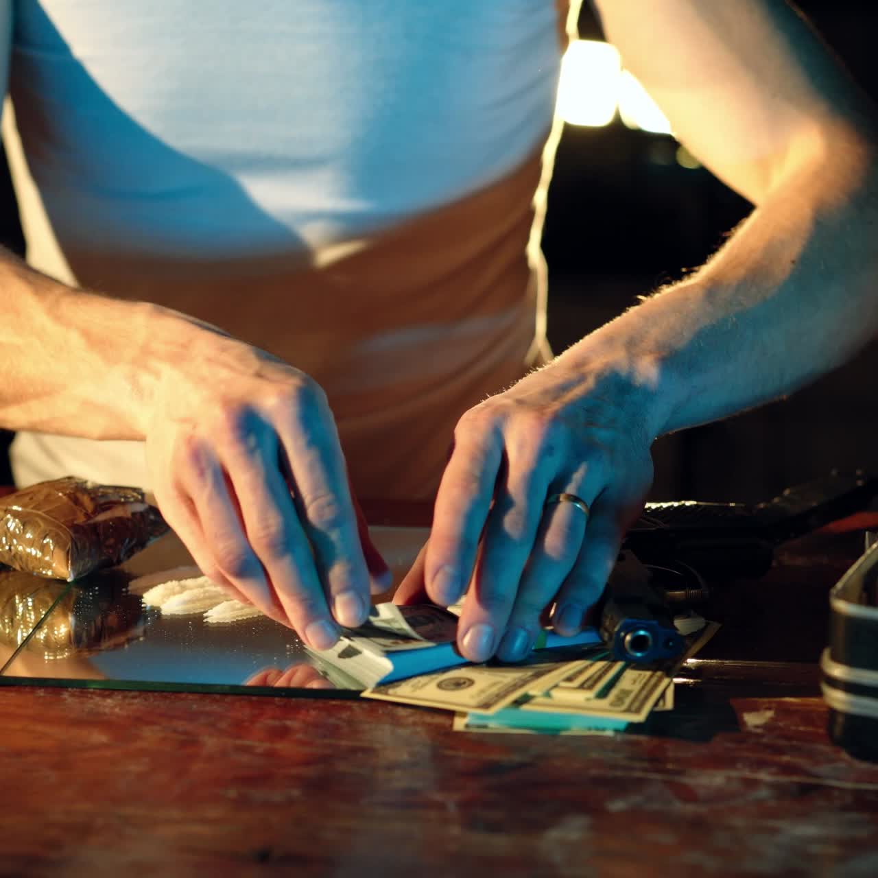 Drug addict preparing cocaine lines. Cocaine powder sorted. Concept of drug abuse. Social problems