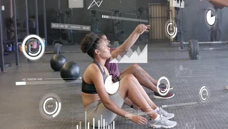 animation of diagrams and data processing over diverse couple exercising at gym