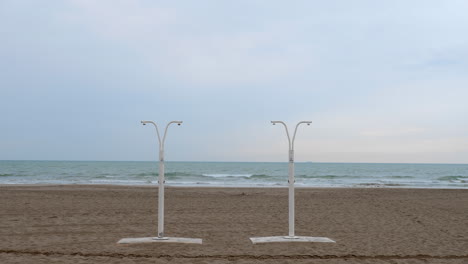 shower racks on the beach