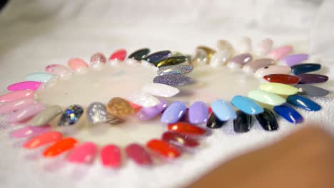 several nail polish palettes lying around.
