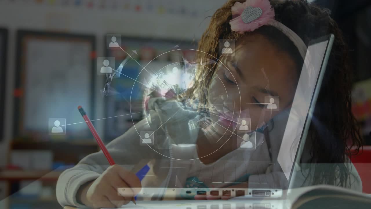 Girl writing notebook switching pen and generating network graphics over laptop in classroom