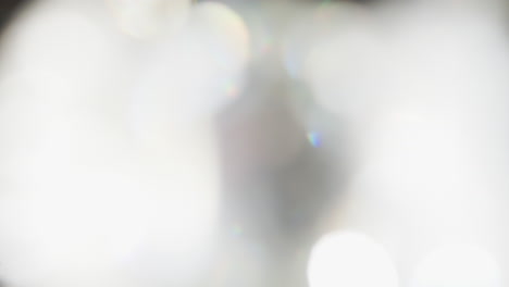 glass jewel prism real rotate and beam light transition on white abstract effect