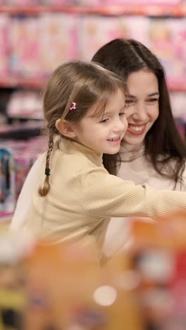 mother and daughter shopping for toys