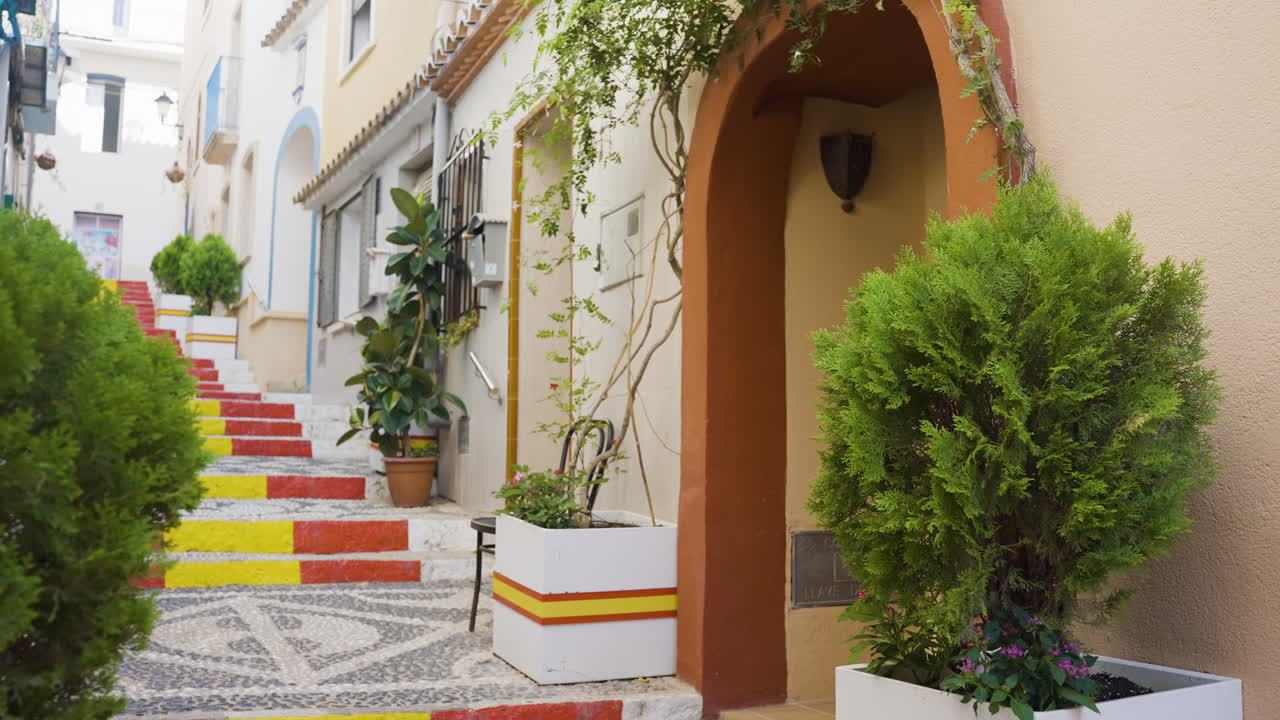 Colorful Spanish Alleyway with Stairs and Plants