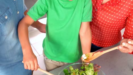 Family-preparing-salad-together