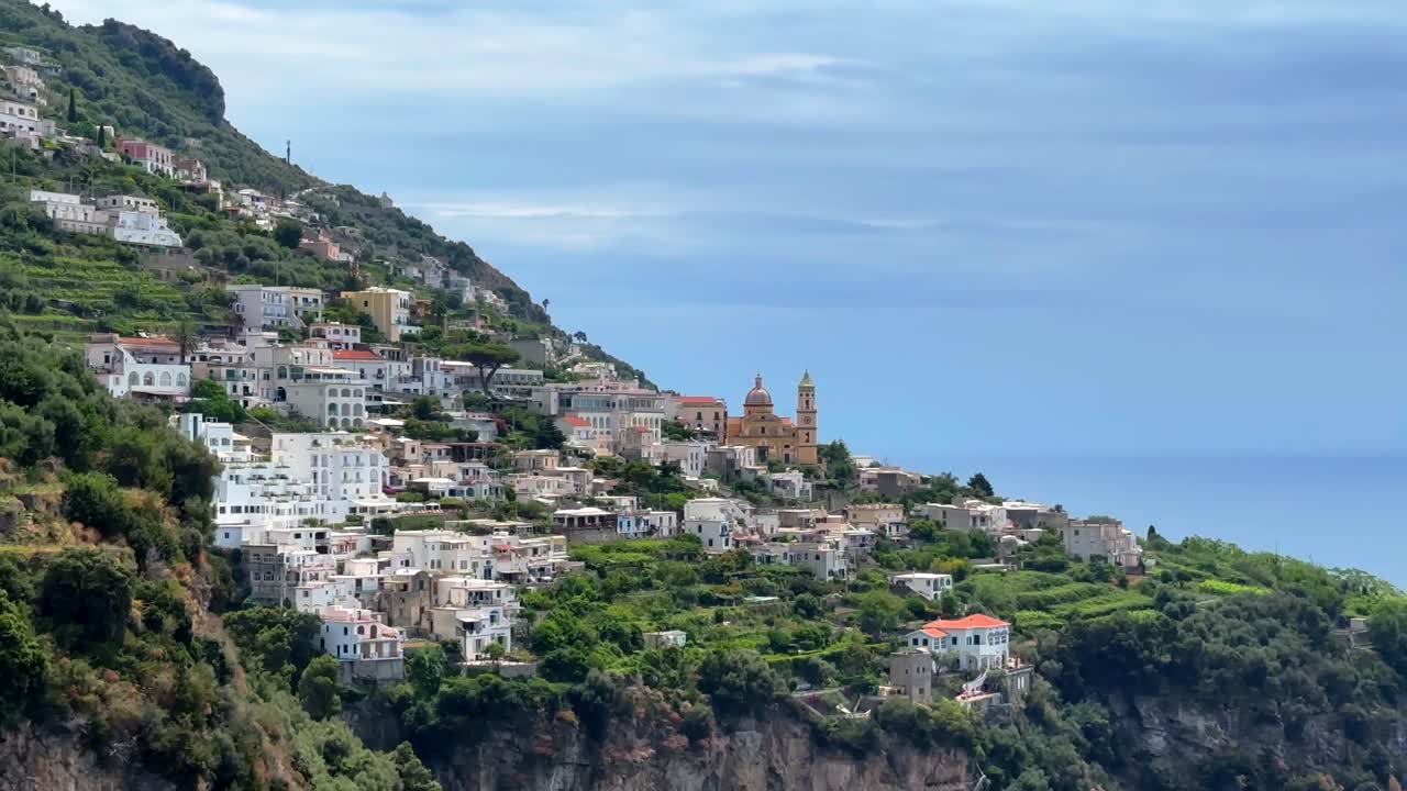 Parish Church Of Saint Januarius And The Town Of Praiano Overlooking The Amalfi Coast In Italy.