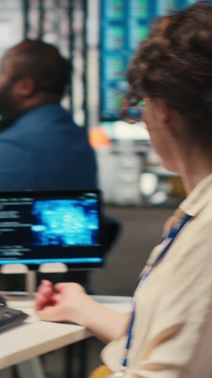 Vertical Video Office administrator checking monthly reports with AI analytics platform