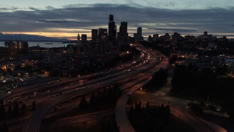 busy city aerial hyperlapse of cars driving by skyline