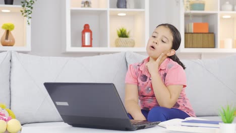 Thoughtful-girl-child-focused-on-tech-stuff.