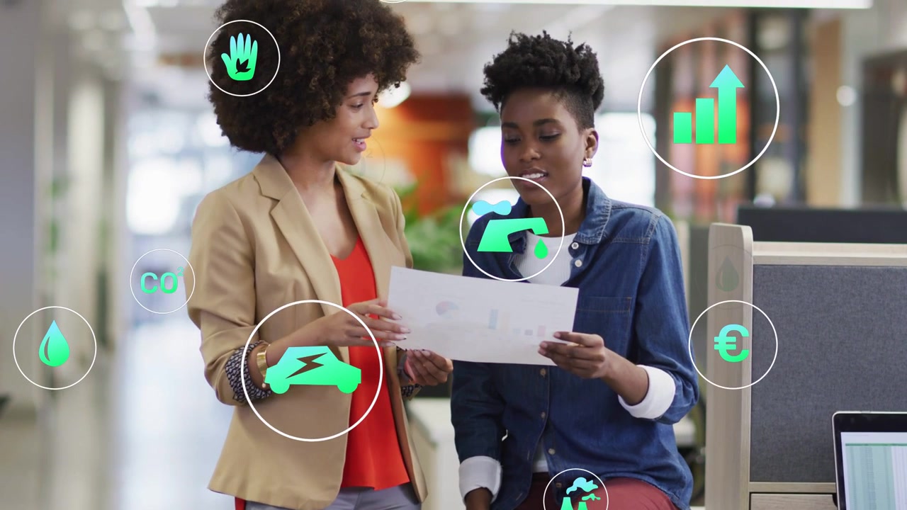 Standing woman pointing sheet, peer exchanging sheet while business icons hovering, both reviewing