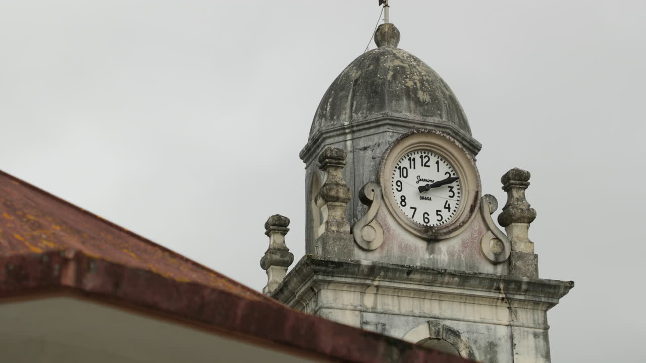 Traditional Clock Tower At The Catholic Church In Igreja Velha In Portugal