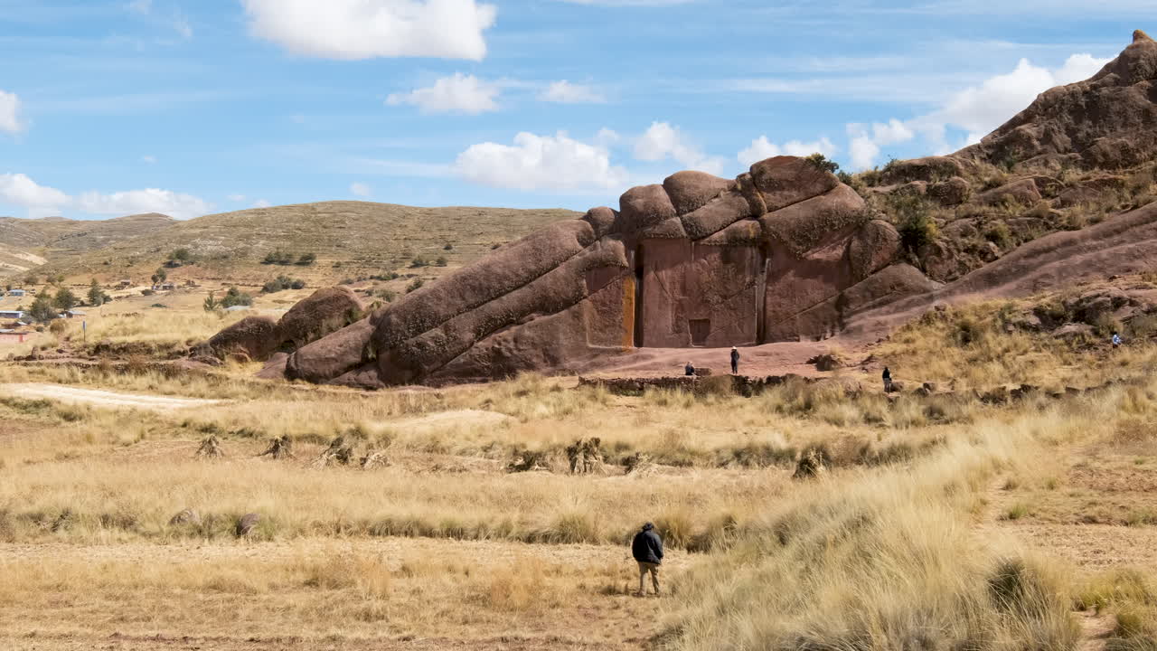 Explore the enigmatic Aramu Muru Portal archaeological site in Peru. This video captures the impressive ancient stone structure set within a vast