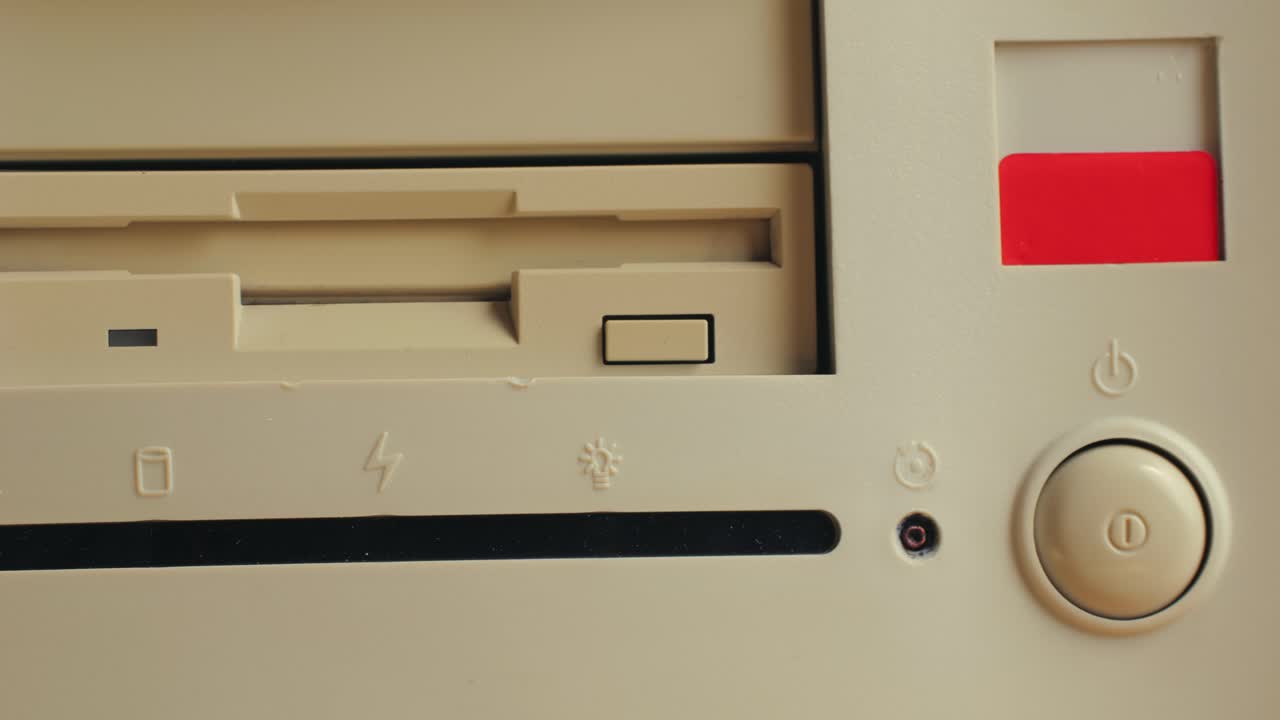 Using diskette for old computer. Music recorder, playing retro computer games. Vintage device for office, obsolete technology. . High quality 4k footage