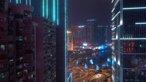 night time illuminated macau downtown traffic street view aerial panorama 4k china