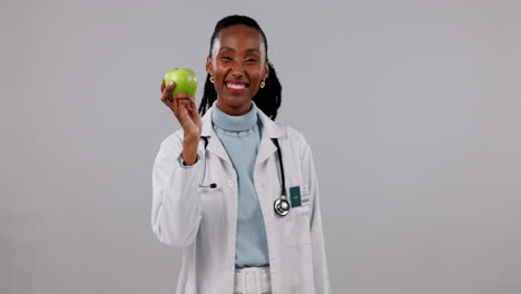 black woman, doctor with apple and face