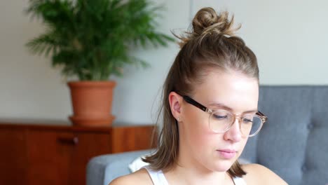 close-up of woman in spectacles