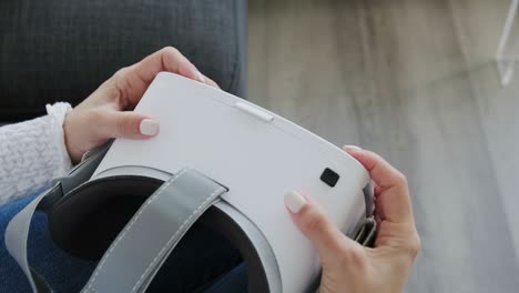 woman using phone with headset for virtual reality gaming