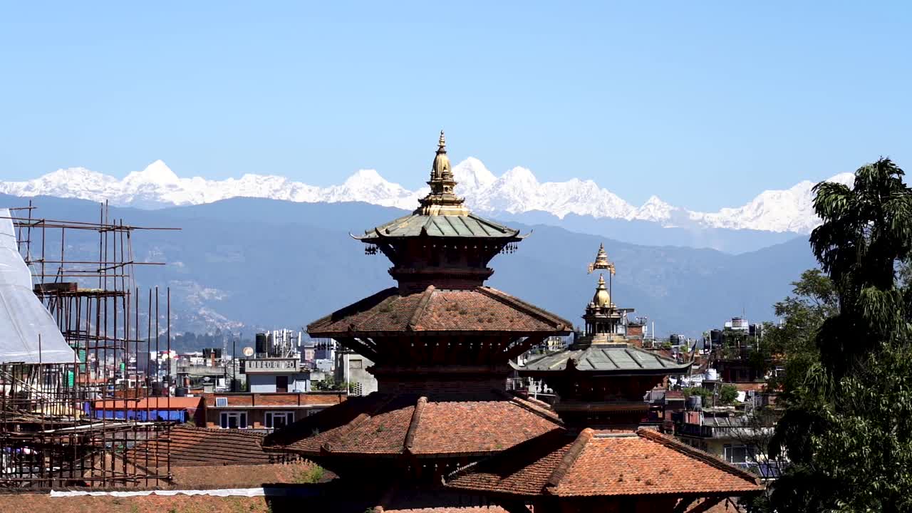 Landscape view of Patan durbar heritage site and mountain backround in Laitpur, Nepal.
