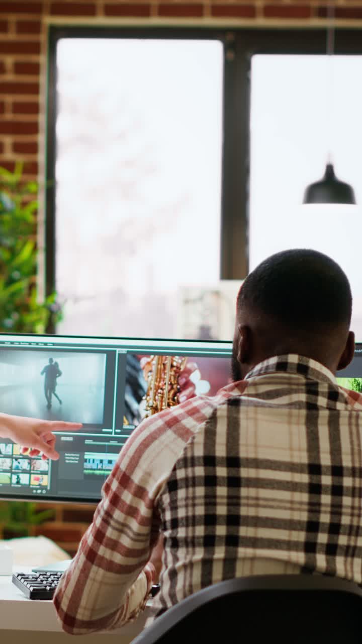 Vertical Video Creative interracial couple collaborating on video editing process