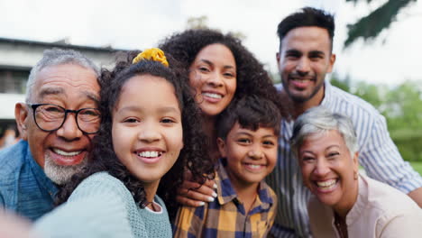 happy multi-generational family selfie