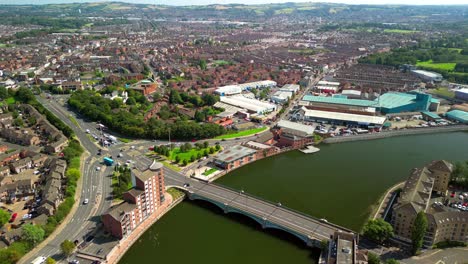 Passing overhead aerial GV of Queen&#039;s Bridge in Belfast City Centre, Northern Ireland, UK on a bright and sunny day. Produced in 4K, 60FPS and with Rec709 color