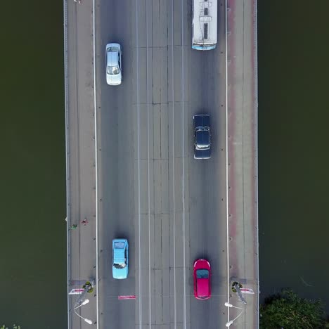 bridge road with automobile traffic. vinnitsa, ukraine - july 2017: aerial top view of bridge road automobile traffic of many cars, transportation concept
