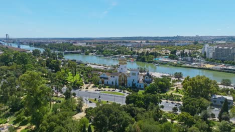 aerial view of seville professional dance conservatory building by the guadalquivir river in spain