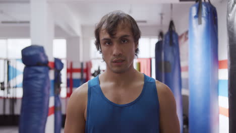 front view of caucasian man at the boxing gym