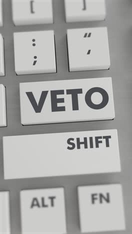naciśnięcie przycisku veto na klawiaturze wideo pionowe