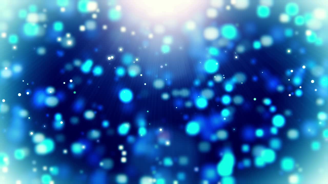 Blue blurred Christmas snowfall abstract background with floating bokeh circles. 4K UHD video animation loop