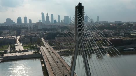 Aerial-view-of-Świętokrzyski-Bridge-and-Warsaw-city-skyline-in-the-background