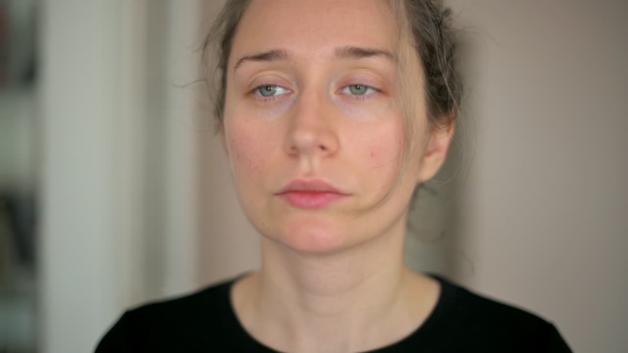 Close up of a tired woman in sportswear