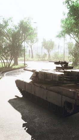 tanque militar en un camino a través de un parque