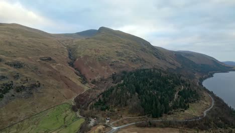 cinematic aerial winter footage of thirlmere lake, reservoir in the borough of allerdale in cumbria