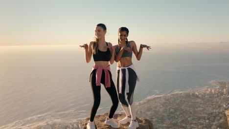 best-friends-dancing-on-mountain-top-celebrating-successful-hiking-adventure-with-funny-victory-dance