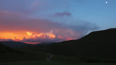 a wide shot of a beautiful, colorful sunset in the mountains of utah, near wanship and park city