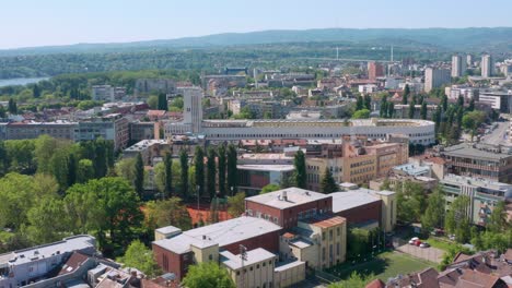 Aerial-shot-circling-around-various-government-buildings-in-downtown-Novi-Sad,-Serbia