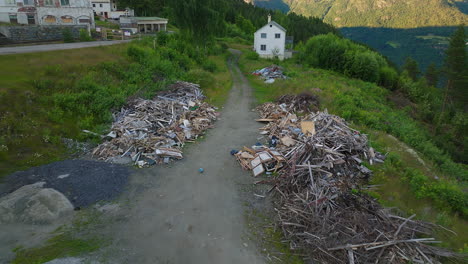 piles of debris in front of haunted luster sanatorium, norway