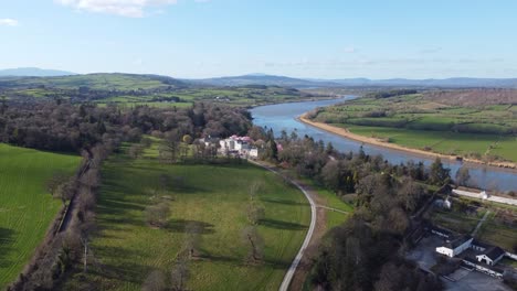 Waterford-Ireland-Mount-Congreve-and-the-Suir-River,-in-the-background-the-Comeragh-Mountains-and-Sliabh-Na-Man-on-a-warm-early-spring-day