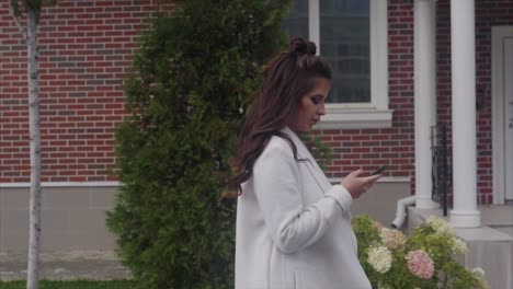 woman using phone outside
