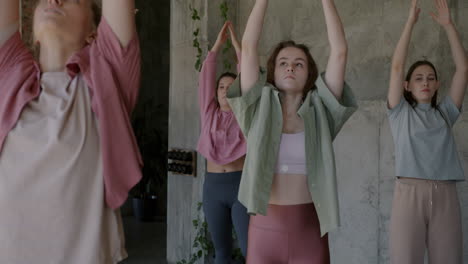women practicing yoga or dance class