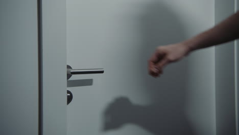 person entering/exiting a room