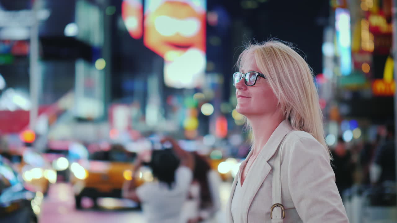 Attractive Woman Admiring The Lights Of The Famous Time Square In New York Yellow Cabs Passing By - 