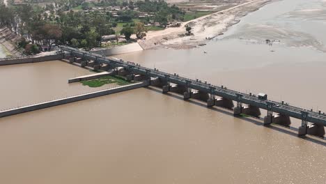 aerial shot of bride over the indus river pakistan