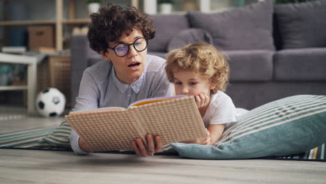 mother and son reading together