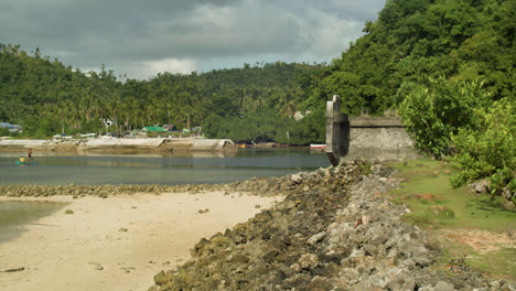 an unfinished bridge leading to union road in siargao island, philippines.