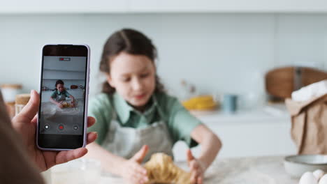 girl kneading a dough