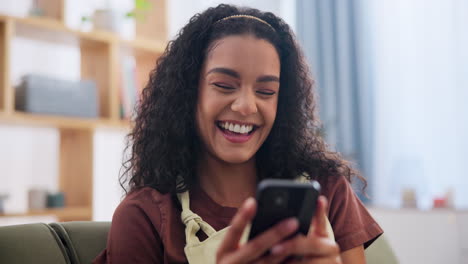 woman smiling and texting on phone