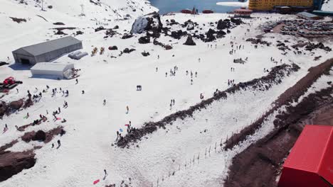 Tourists-At-Portillo-Ski-Resort-In-Chile---aerial-drone-shot